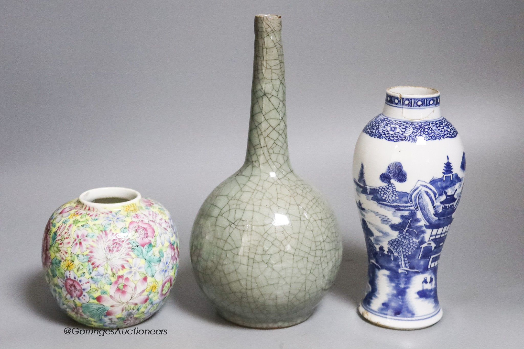 A Chinese crackleglaze bottle vase, a blue and white vase and a 'thousand flower' jar, tallest 24cm